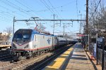 Amtrak Sprinter # 608 sits on the rear of Amtrak Train # 660 while it discharges and receives passengers 